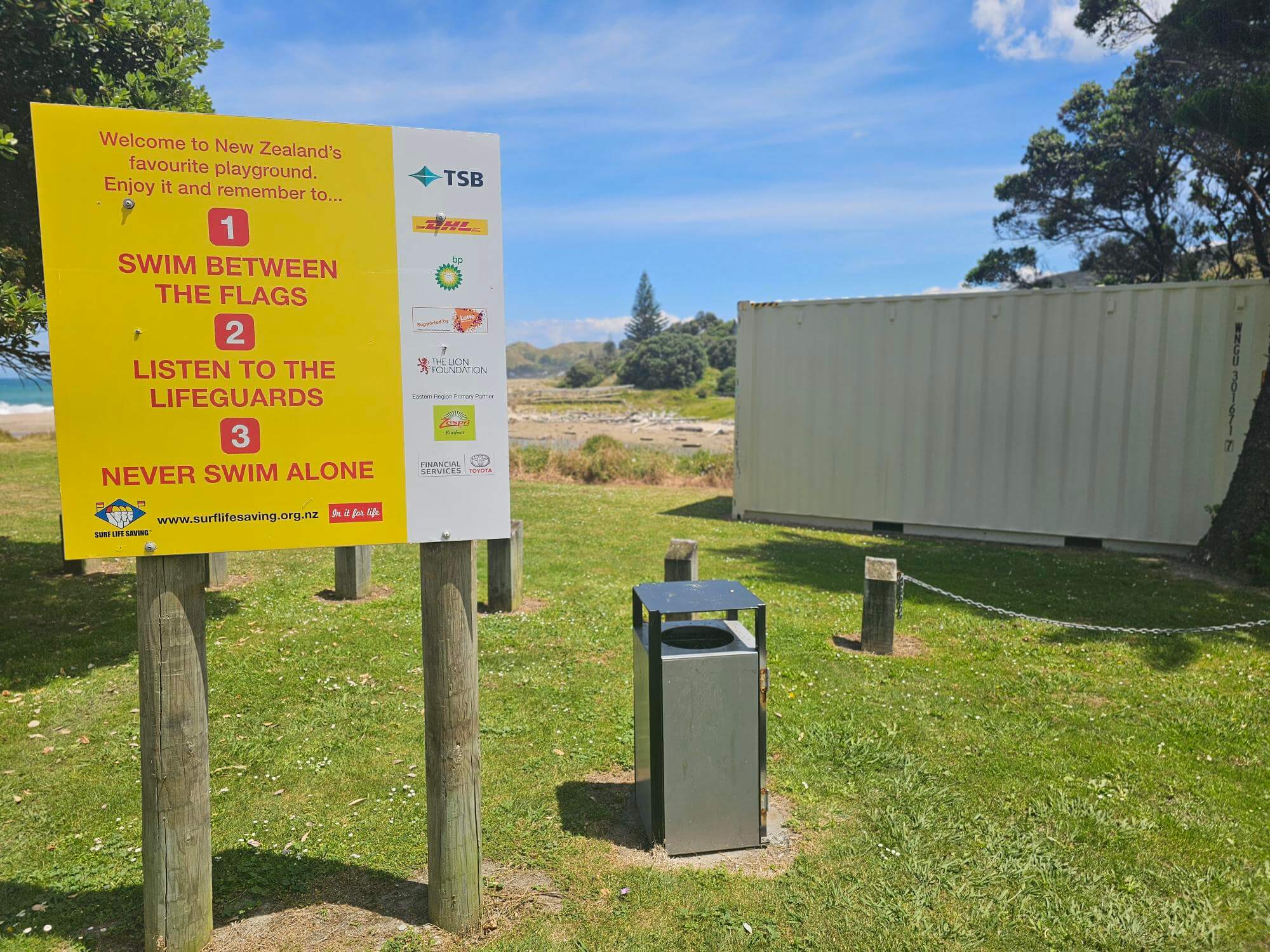 A shipping container securely stores equipment at Wainui Surf Club