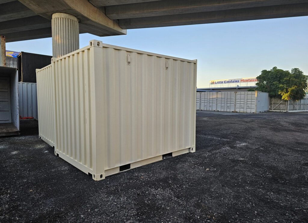 Beige 10ft shipping container in the yard